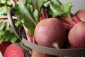 Fresh red beets with leaves in basket Royalty Free Stock Photo