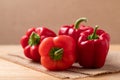 Fresh red bell pepper or sweet pepper on wooden background Royalty Free Stock Photo