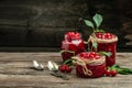 Fresh red cherries fruit on wooden background. Jar of cherry jam and sour cherries. Berries cherry with syrup. Canned fruit. place Royalty Free Stock Photo