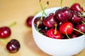 Fresh red cherries fruit on wooden floor background Royalty Free Stock Photo