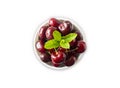 Fresh red cherries isolated on white background. Cherries in a bowl on white. Cherry fruit with copy space for text. Ripe cherry o Royalty Free Stock Photo