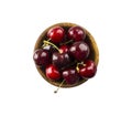 Fresh red cherries lay on white isolated background with copy space. Cherries in a wooden bowl. Background of cherries. Ripe cherr Royalty Free Stock Photo