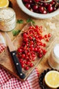 Fresh red cherries on a rustic wooden table. Ripe cherries i o Royalty Free Stock Photo