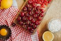 Fresh red cherries on a rustic wooden table. Ripe cherries i o Royalty Free Stock Photo