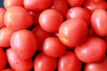 Close up photo of fresh red cherry tomatoes. Good for presentation background and recipe content.