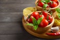 Fresh red cherry tomatoes with raw pasta, basil, chili pepper and garlic for Italian food Royalty Free Stock Photo