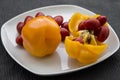 Red cherry tomatoes and yellow bell peppers close up Royalty Free Stock Photo