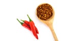 Fresh red chilli pepper and crushed dried red cayenne pepper wit Royalty Free Stock Photo