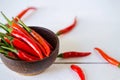 fresh red chilli with wooden bowl Royalty Free Stock Photo