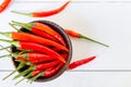 fresh red chilli with wooden bowl Royalty Free Stock Photo