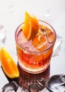 Fresh red colorful alcoholic cocktail Aperol Spritz with orange and ice Royalty Free Stock Photo