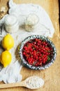 Fresh red currant on wooden table, bucket with red currant berri Royalty Free Stock Photo