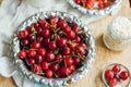 Fresh red currant on wooden table, bucket with red currant berri Royalty Free Stock Photo