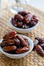 Fresh red dates hurma in bowl Royalty Free Stock Photo