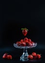 Fresh and red, exclusive strawberries in a special crystal bowl