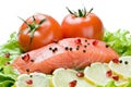 Fresh red fish with lemon and vegetables Royalty Free Stock Photo