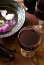 Fresh red grape juice and flowers Royalty Free Stock Photo
