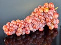 Fresh red grapes with water drops on gray background Royalty Free Stock Photo