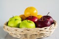 Fresh red green apple and orange over gray black background Royalty Free Stock Photo