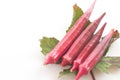 Fresh red okra with leave isolated on white background. Royalty Free Stock Photo