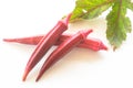 Fresh red okra with leave isolated on white background.