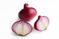 Fresh red onion, one whole bulb and one cut in half Royalty Free Stock Photo