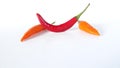Fresh red and orange peppers are placed close together, Royalty Free Stock Photo