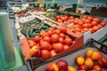 Fresh red organic tomatoes and other vegetables in farmers market or supermarket shelf, healthy food Royalty Free Stock Photo