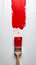 Fresh Red Paint Stroke on a White Surface Royalty Free Stock Photo