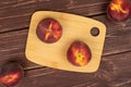 Fresh red peach on brown wood Royalty Free Stock Photo