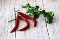 Fresh red pepper chilli on old wooden background. Royalty Free Stock Photo