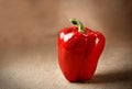 Fresh red pepper on sacking background