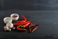Fresh red peppers and of dried pods of chili peppers, garlic, sa Royalty Free Stock Photo