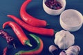 Fresh red peppers and of dried pods of chili peppers, garlic, sa Royalty Free Stock Photo