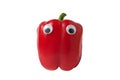 Fresh red peppers with Googly eyes isolated on white background. Food with funny faces