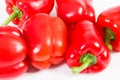 Fresh red peppers lying on white background, healthy nutrition concept Royalty Free Stock Photo