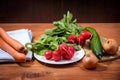 Fresh red radishes on wooden table Royalty Free Stock Photo