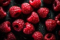 Fresh red raspberries are covered with water droplets. Raspberry background.