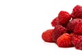 Fresh and red raspberries with vitamins on a white background
