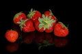 Fresh red ripe strawberries on a black background Royalty Free Stock Photo