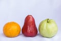 Fresh red rose apple,orange and green guava clean fruit Royalty Free Stock Photo