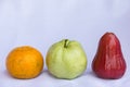 Fresh red rose apple,orange and green guava clean fruit Royalty Free Stock Photo