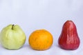 Fresh red rose apple,orange and green guava clean fruit Royalty Free Stock Photo