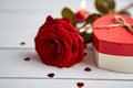 Fresh red rose flower on the white wooden table Royalty Free Stock Photo