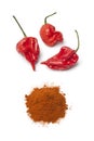 Fresh red scorpion chili peppers and chili powder Royalty Free Stock Photo