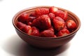 Fresh red strawberries in a ceramic salad bowl on a white background Royalty Free Stock Photo