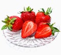 Fresh red strawberries in a glass dish with isolation on a white Royalty Free Stock Photo