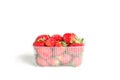 Fresh red strawberries in a plastic transparent container Royalty Free Stock Photo