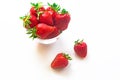 Fresh red strawberries in transparent bowl isolated on white background Royalty Free Stock Photo