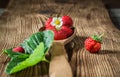 Fresh red strawberries in wooden spoon